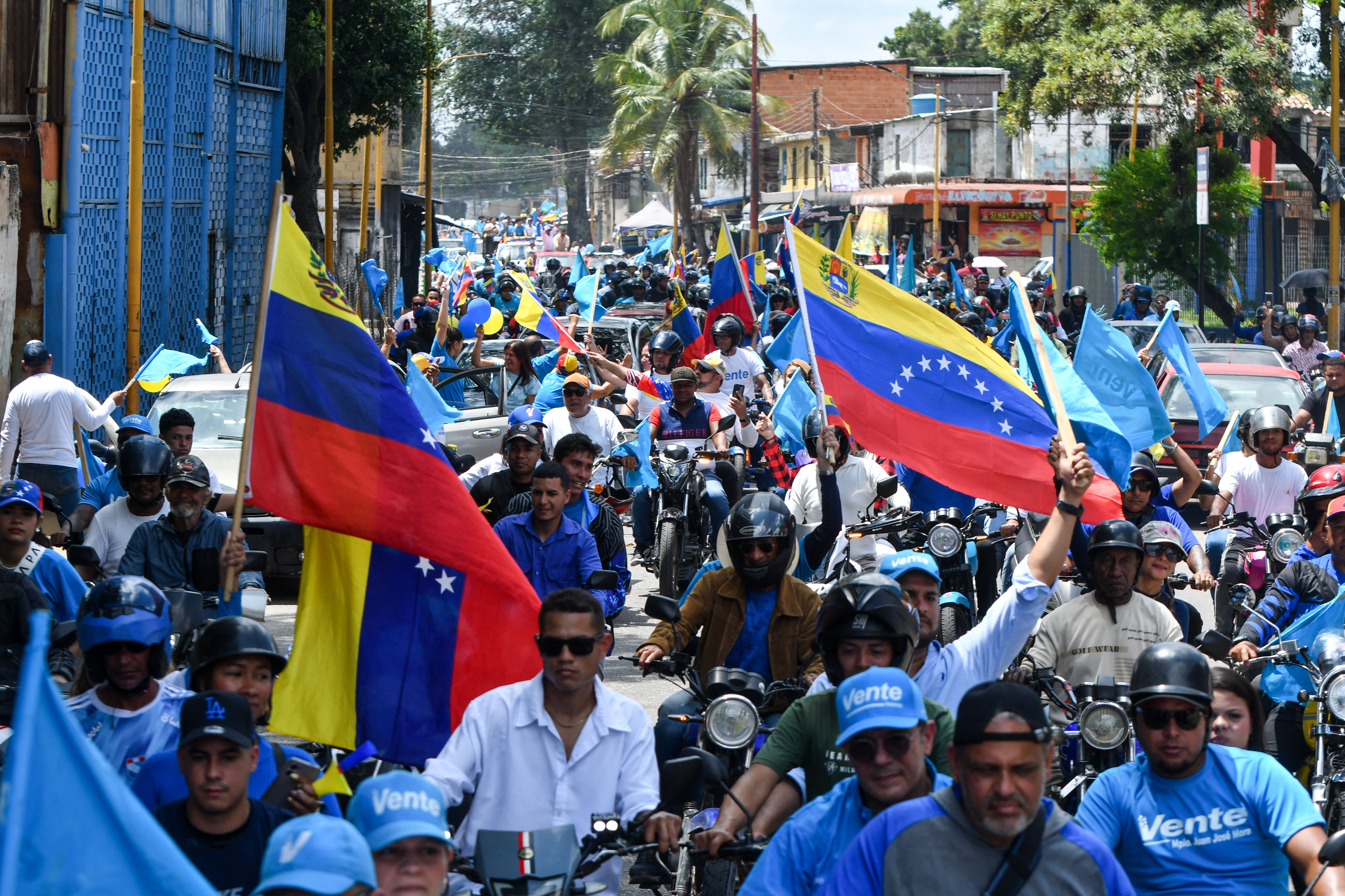 Demonstrators attend a rally to demand the return of Machado