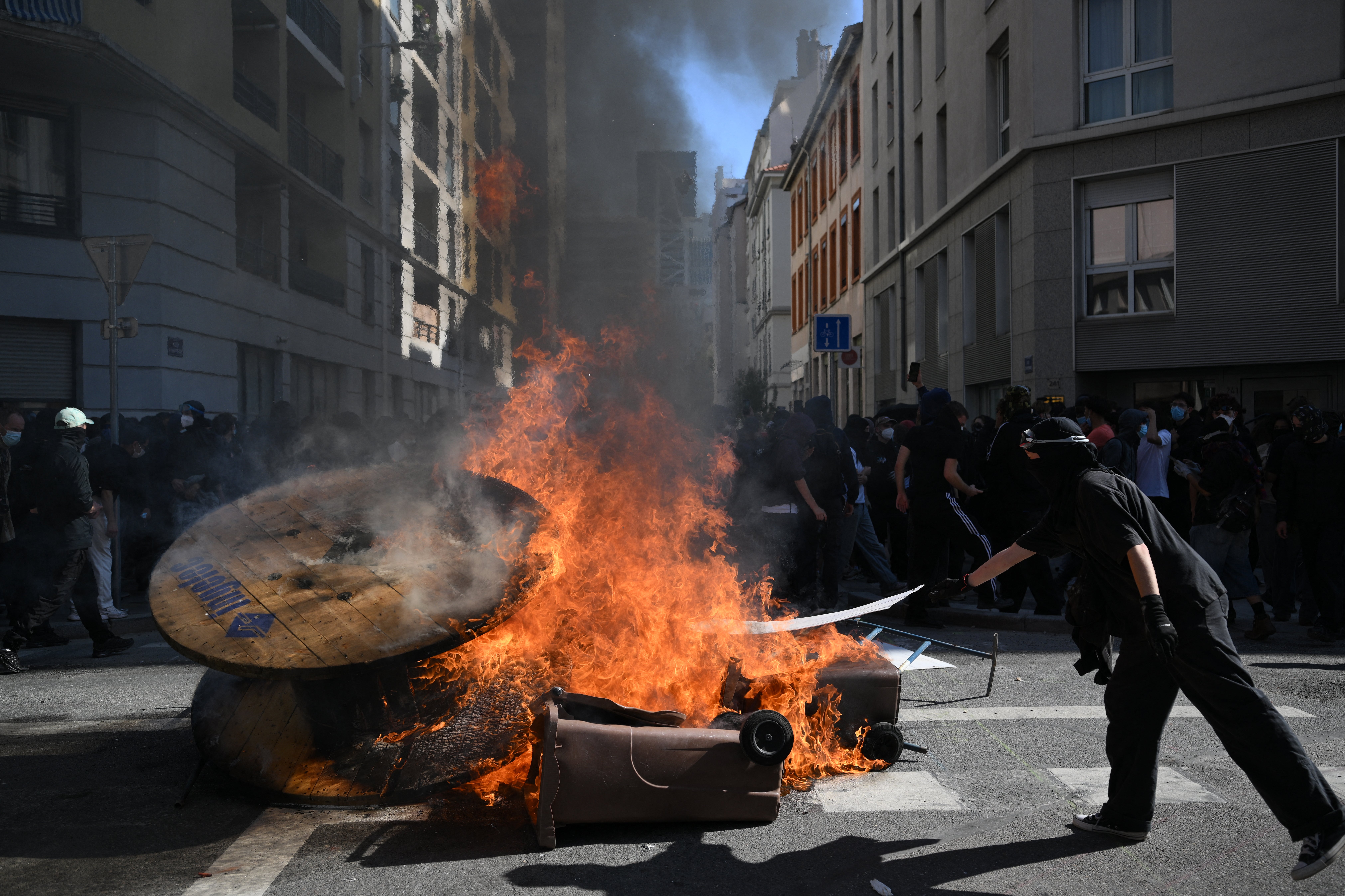 France student protests latest: Riot police use tear gas as more than 80,000 people take to the streets