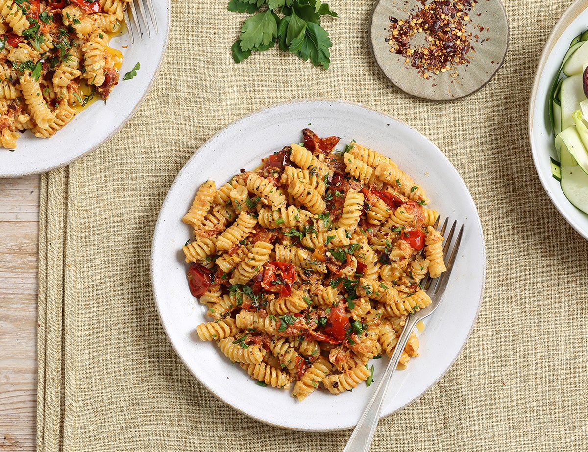 Baked feta and cherry tomatoes make an easy, creamy sauce for fusilli