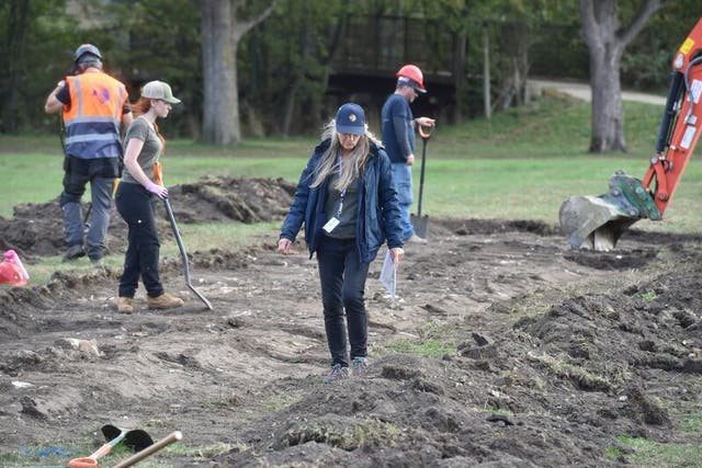 The archaeologists discovered walls, believed to be of individual homes, under the soil