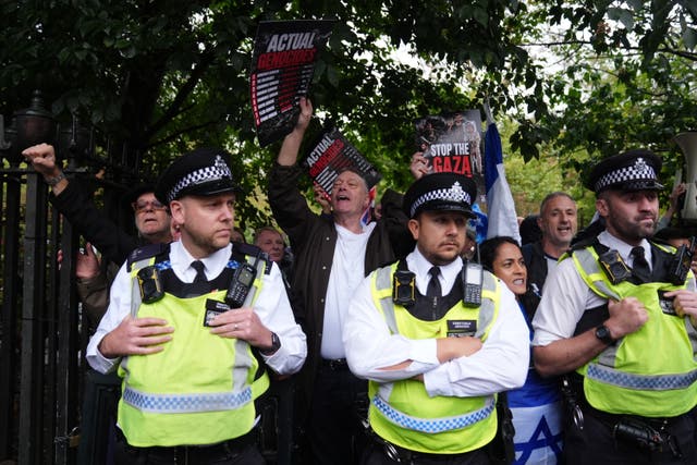 Police with counter-protesters in Russell Square, as a group of students calling themselves the University of London Coalition take part in a pro -Palestine march from Kings College London in the Strand to University College London in Holborn
