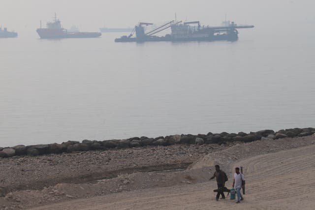 Donald Trump touted his peacemaking efforts Wednesday even as war continues between the U.S. and Iran in the Strait of Hormuz
