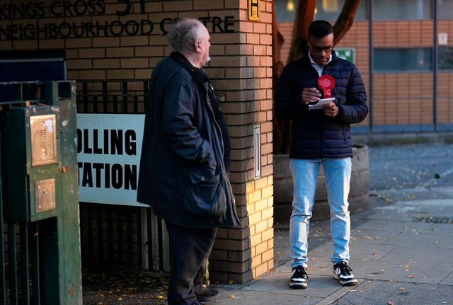 A voter at Kings Cross Brunswick Neighbourhood Association polling station, London, as voting gets underway in the Holborn and St Pancras by-election,
