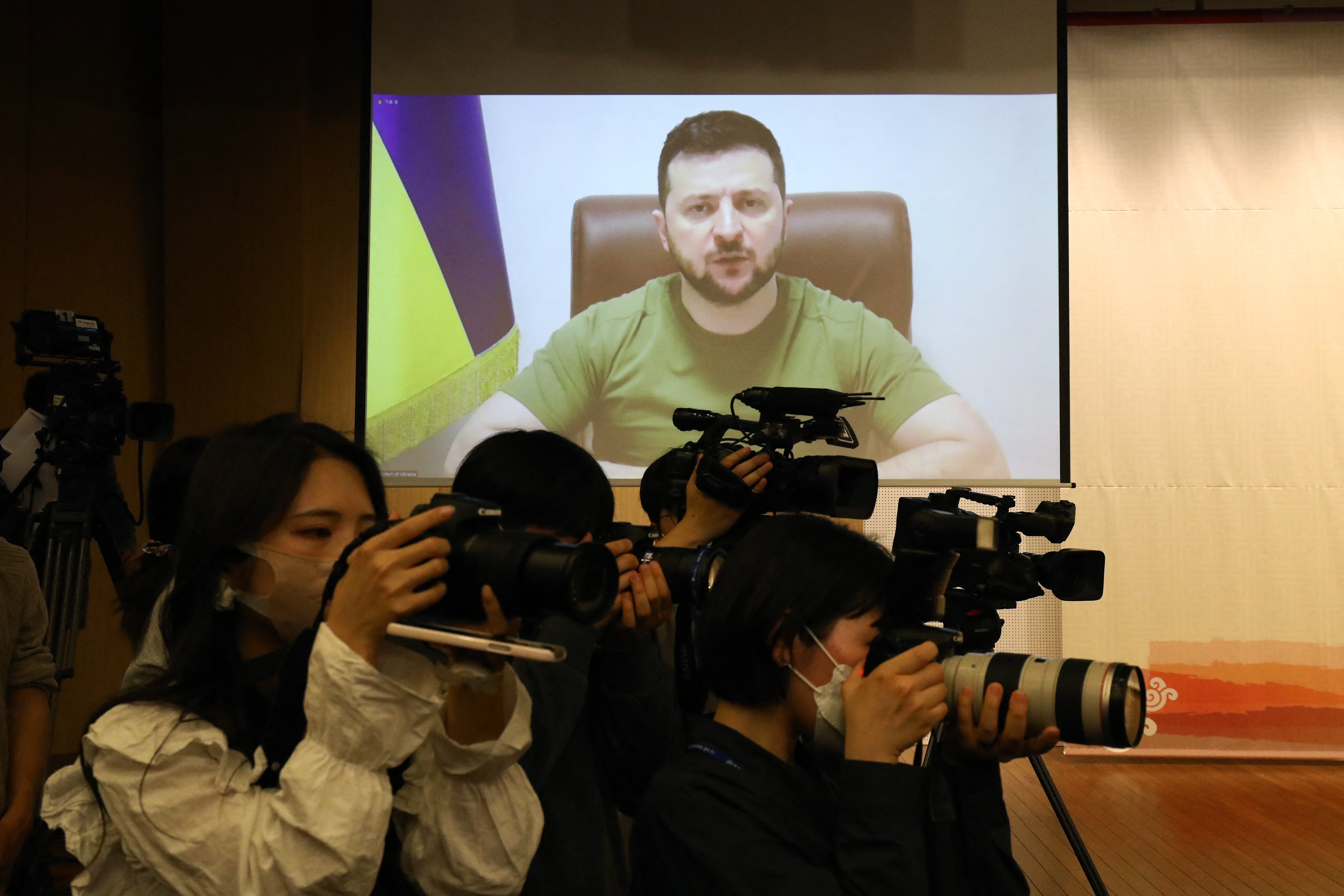 Ukrainian President Volodymyr Zelensky addresses South Korean parliamentary via video link at national assembly in Seoul