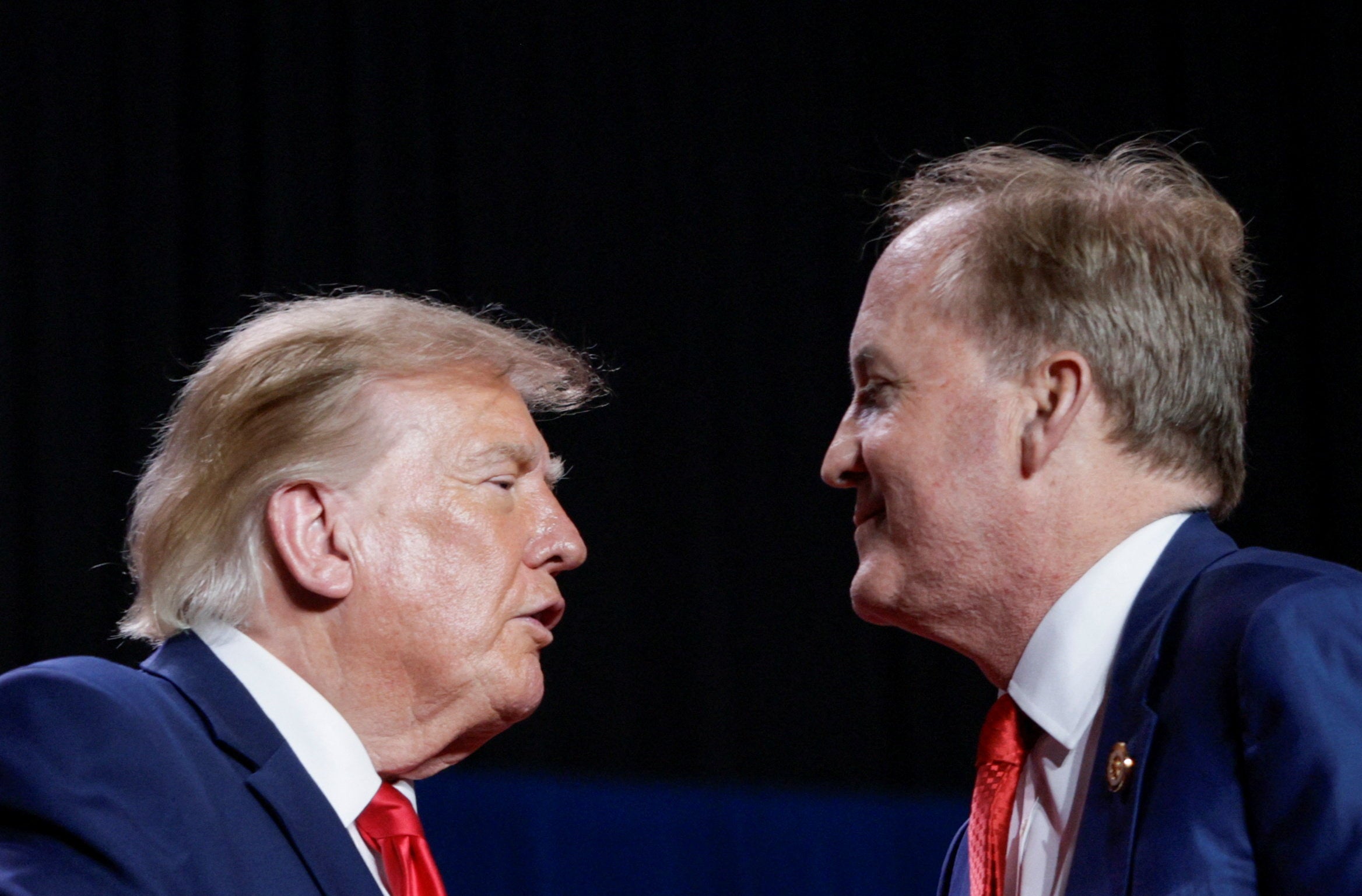Trump has thrown his weight behind Republican US Senate candidate Ken Paxton's (right) campaign