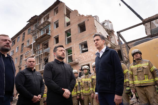 Mr Miliband joined Ukrainian President Volodymyr Zelensky to see the aftermath of the attack