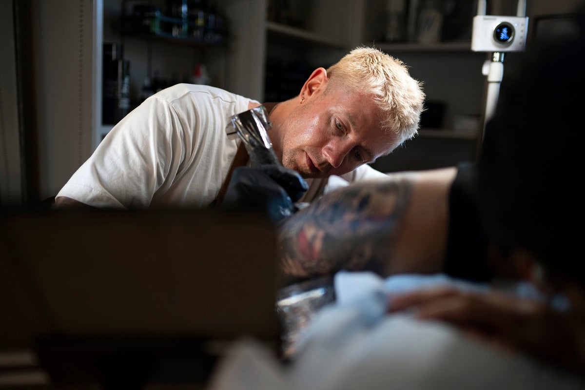 A former SSPX priest embraces life as a gay man and tattoo artist