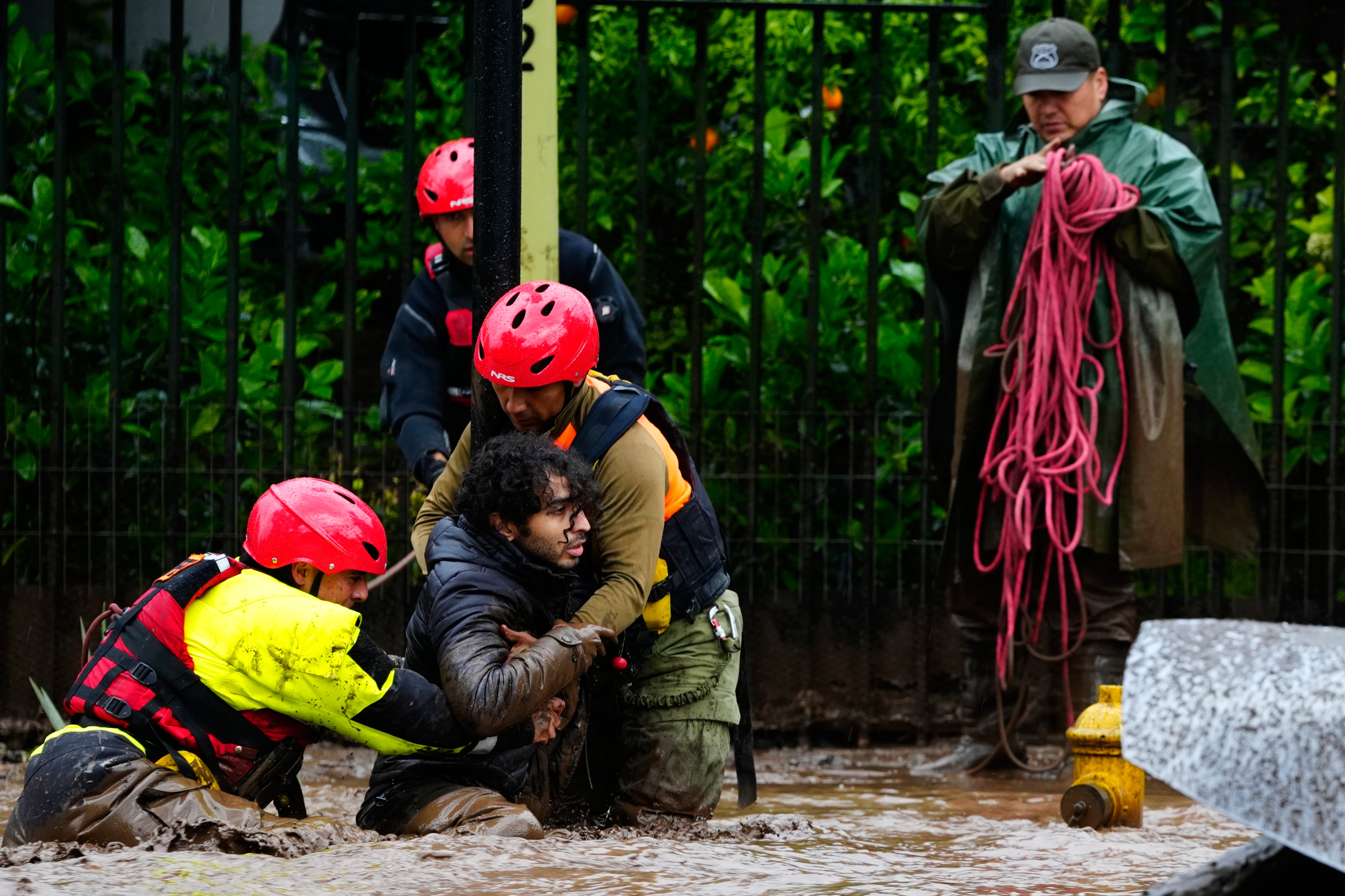 Heavy rain batters Chile’s capital, sweeping away cars and flooding ...