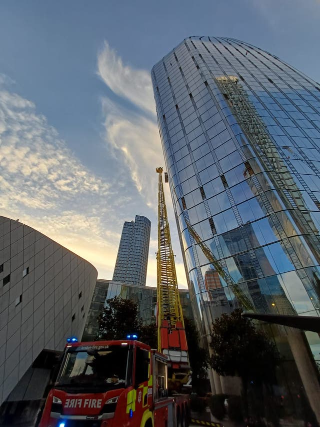 A 64m turntable ladder was sent to the scene to bring the pair down to safety
