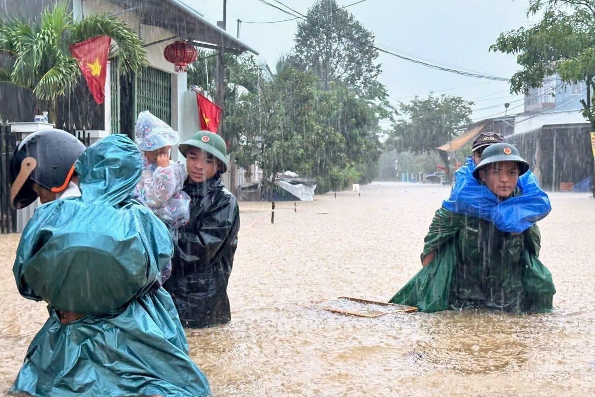 Vietnam mobilizes troops after heavy rains trigger flash floods and raise risks of landslides