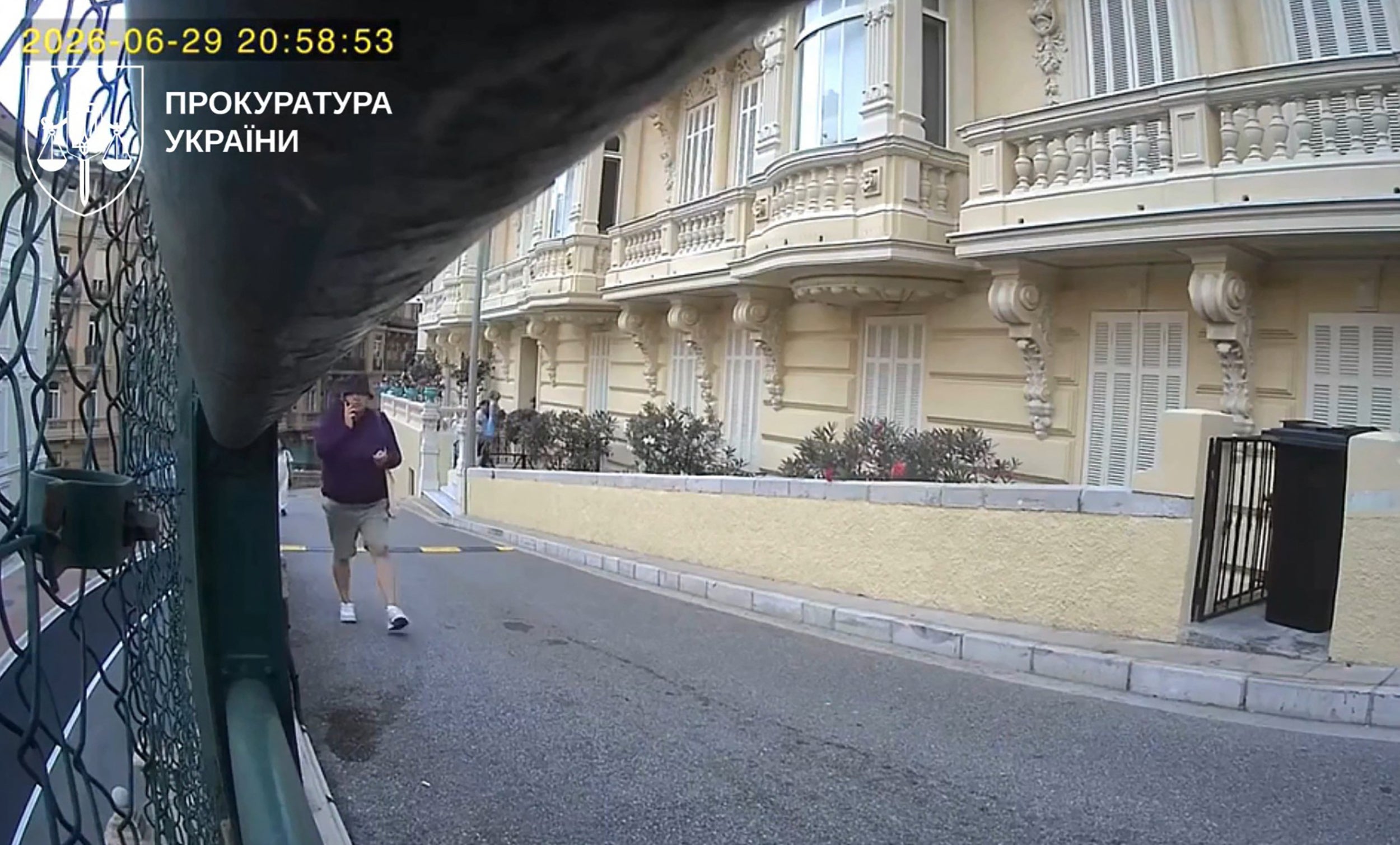 CCTV footage shows a person walking past a luxury apartment complex, moments before the parcel bomb attack in Monaco that wounded Ukrainian-born businessman Vadym Yermolaiev, his partner and teenage son.