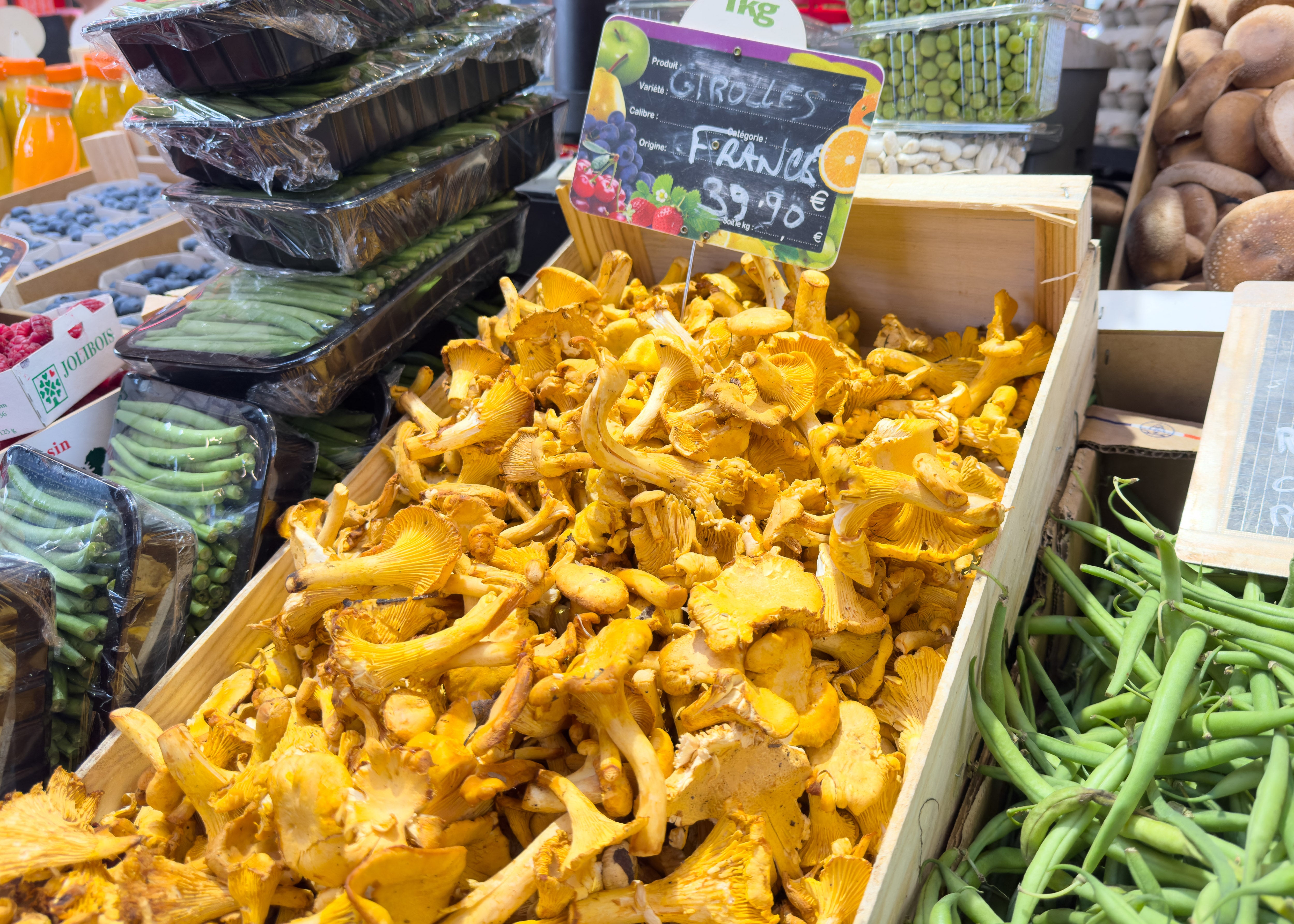 Chanterelle mushrooms displayed for sale at the Halles de Biarritz covered market in Biarritz