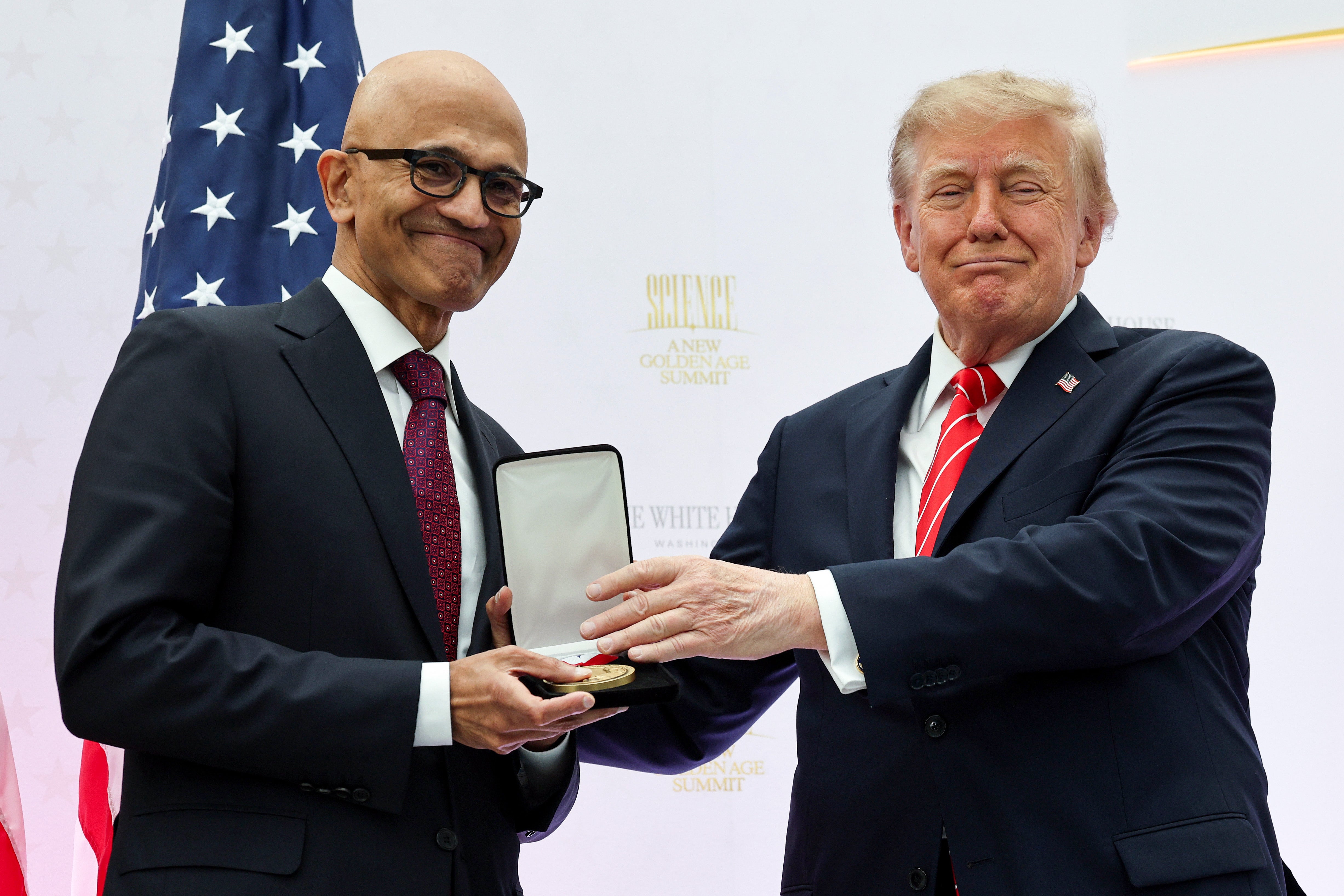 Microsoft CEO Satya Nadella (L) receives the National Medal of Technology and Innovation from U.S. President Donald Trump during the Golden Age of American Innovation Summit at the Institute of Peace on October 08, 2026