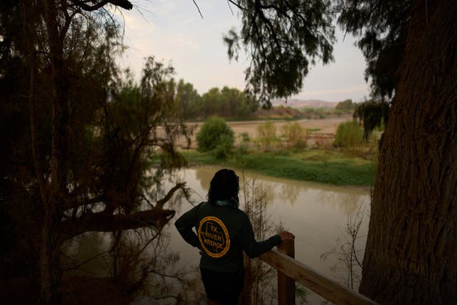 Bibiana Gutierrez stands on her property overlooking the Rio Grande river at the border with Mexico, Thursday, Sept. 24, 2026, in Redford, Texas. (AP Photo/John Locher)