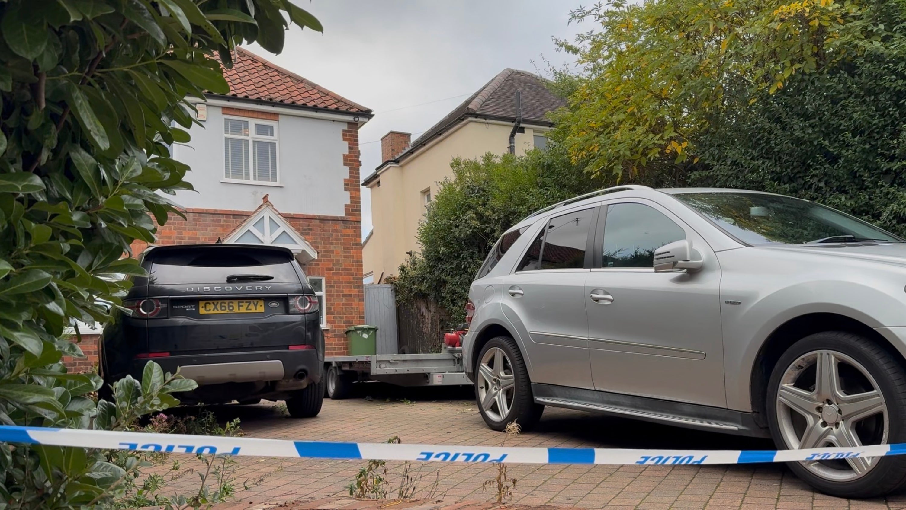Dad and teenage son fighting for lives after masked men storm home during unprovoked attack