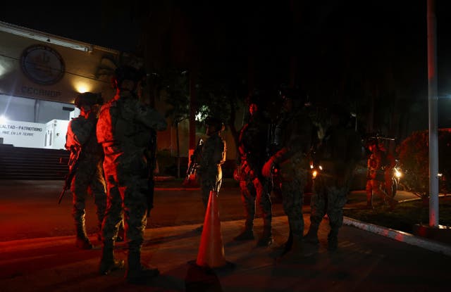 Members of the Mexican Navy prepare to patrol high-risk areas ahead of the expected arrival of Hurricane Simon
