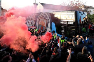 Manchester City can expect a hostile welcome to Anfield (Peter Byrne/PA)