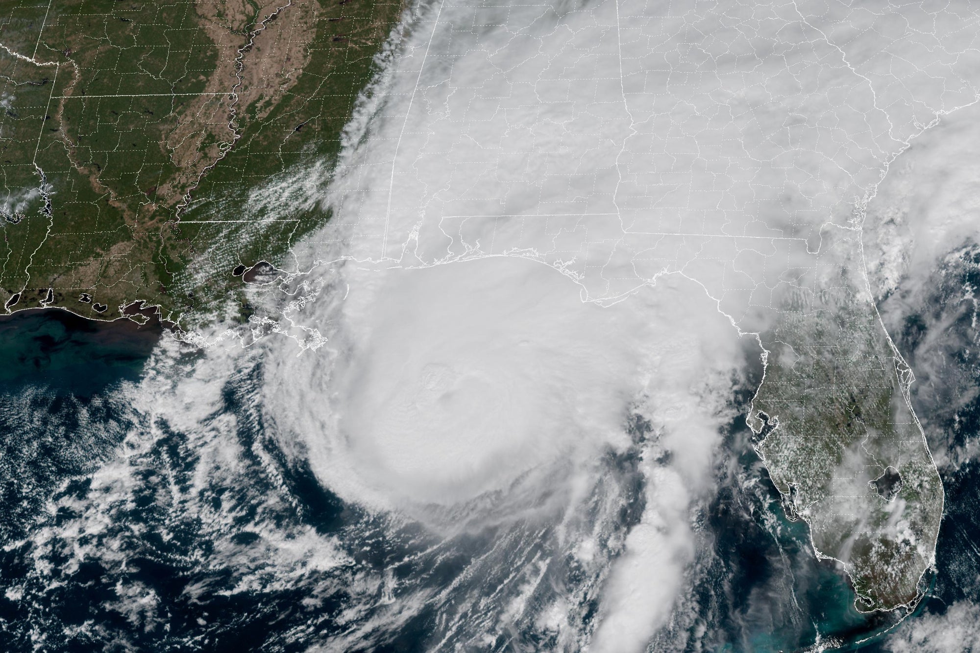 This GOES-19 GeoColor satellite image provided by the National Oceanic and Atmospheric Administration (NOAA) and taken at 1:06 p.m. EDT, Friday, Oct. 9 2026, shows Hurricane Isaias approaching the Gulf Coast of Alabama and Florida