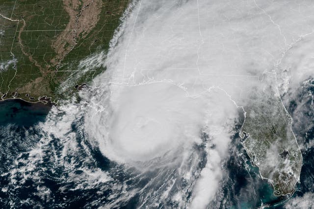 This GOES-19 GeoColor satellite image provided by the National Oceanic and Atmospheric Administration (NOAA) and taken at 1:06 p.m. EDT, Friday, Oct. 9 2026, shows Hurricane Isaias approaching the Gulf Coast of Alabama and Florida