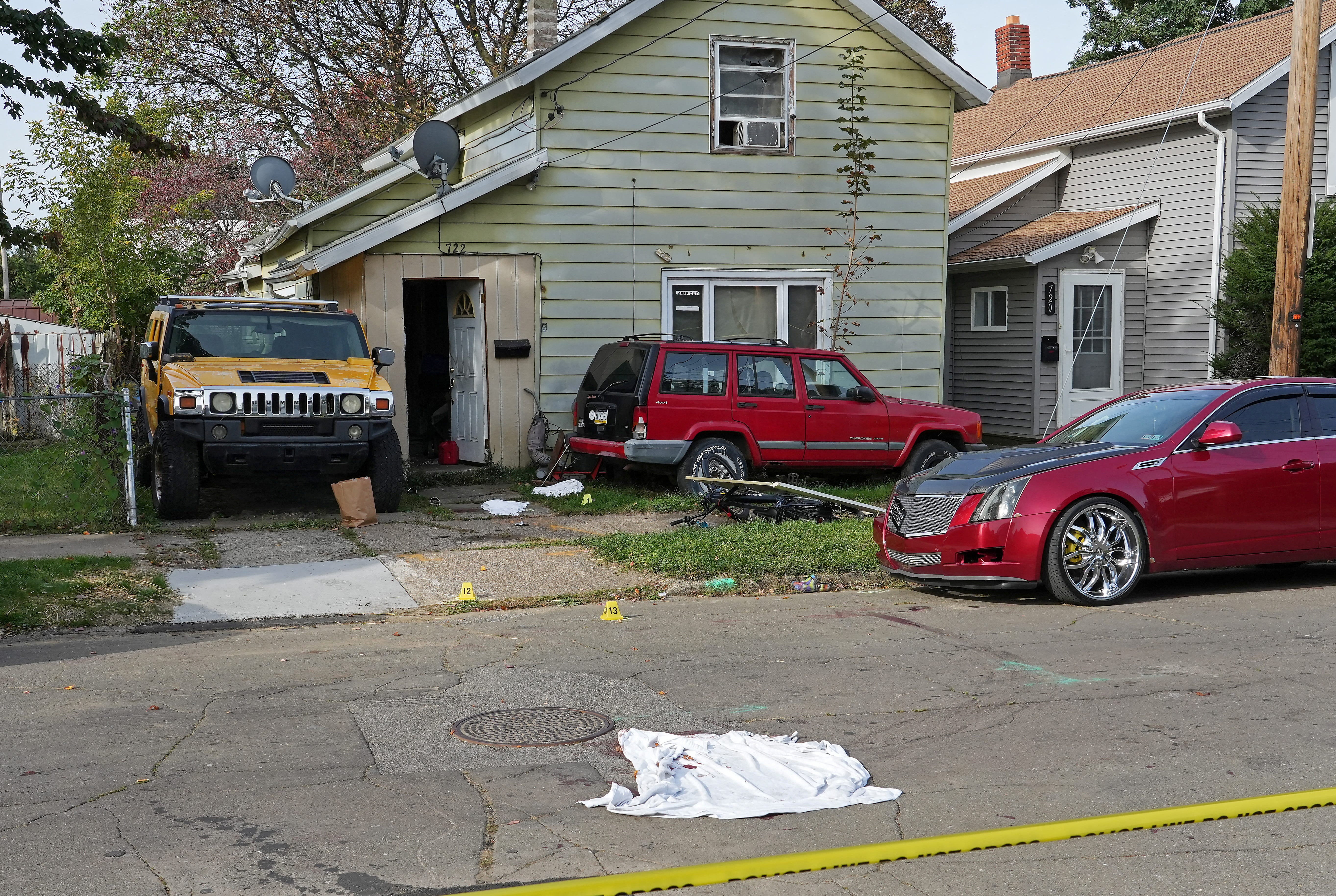 Two women were found shot dead in the street, while the remaining victims and suspected gunman were found dead inside the home