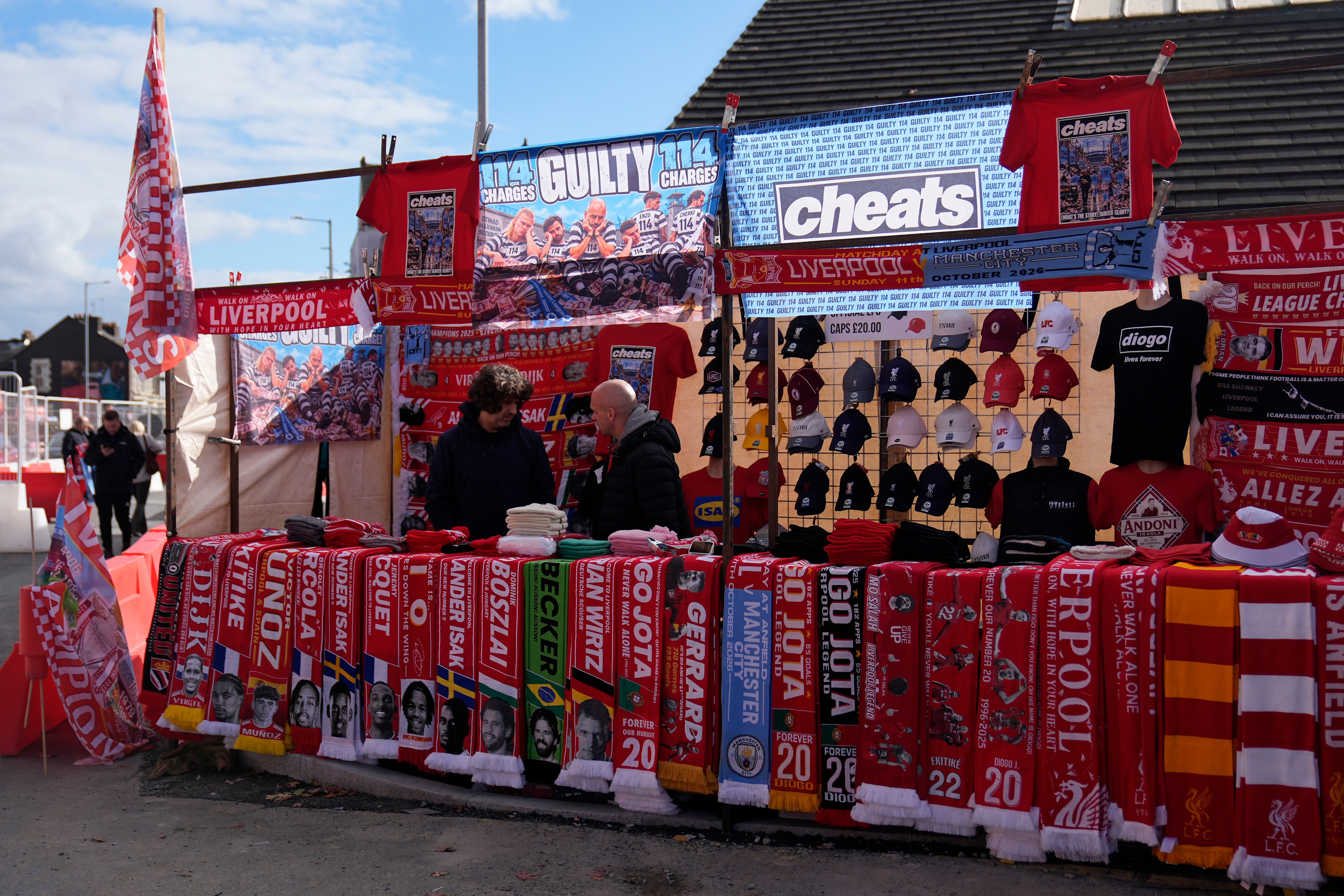 Merchandise sellers acknowledged Manchester City's guilty verdict outside of Anfield