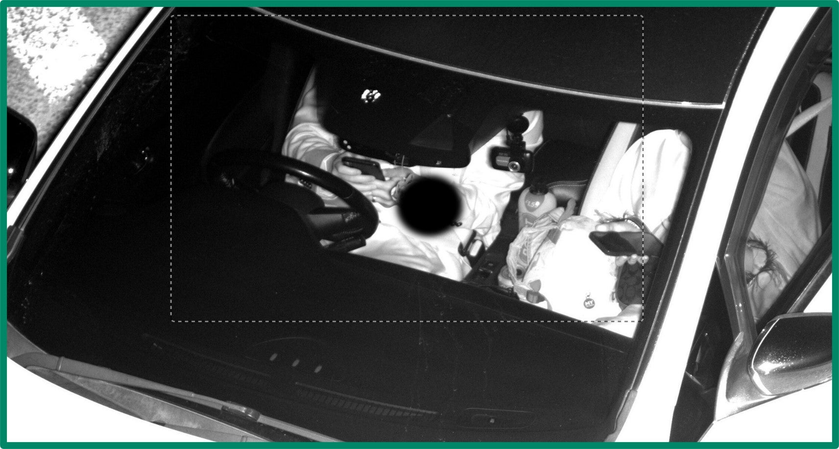 Undated handout photo issued by the West Midands Combined Authority of a person using both hands whilst in a vehicle