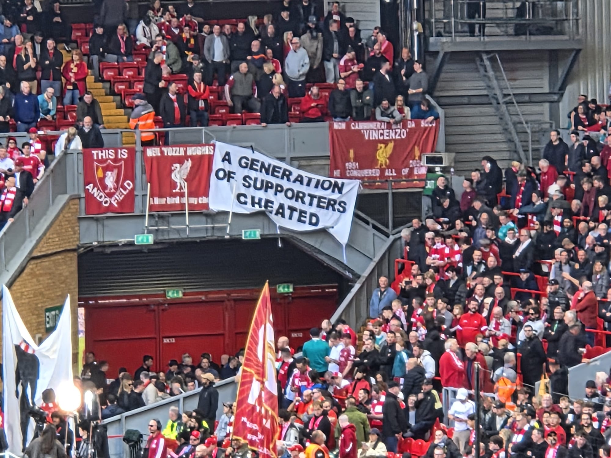 A banner displayed by Liverpool supporters at Anfield
