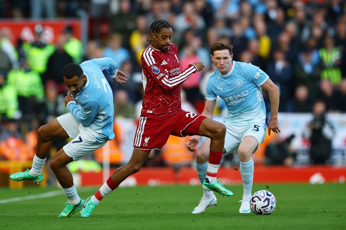 Liverpool vs Manchester City LIVE: City booed by Reds supporters in tense clash at Anfield