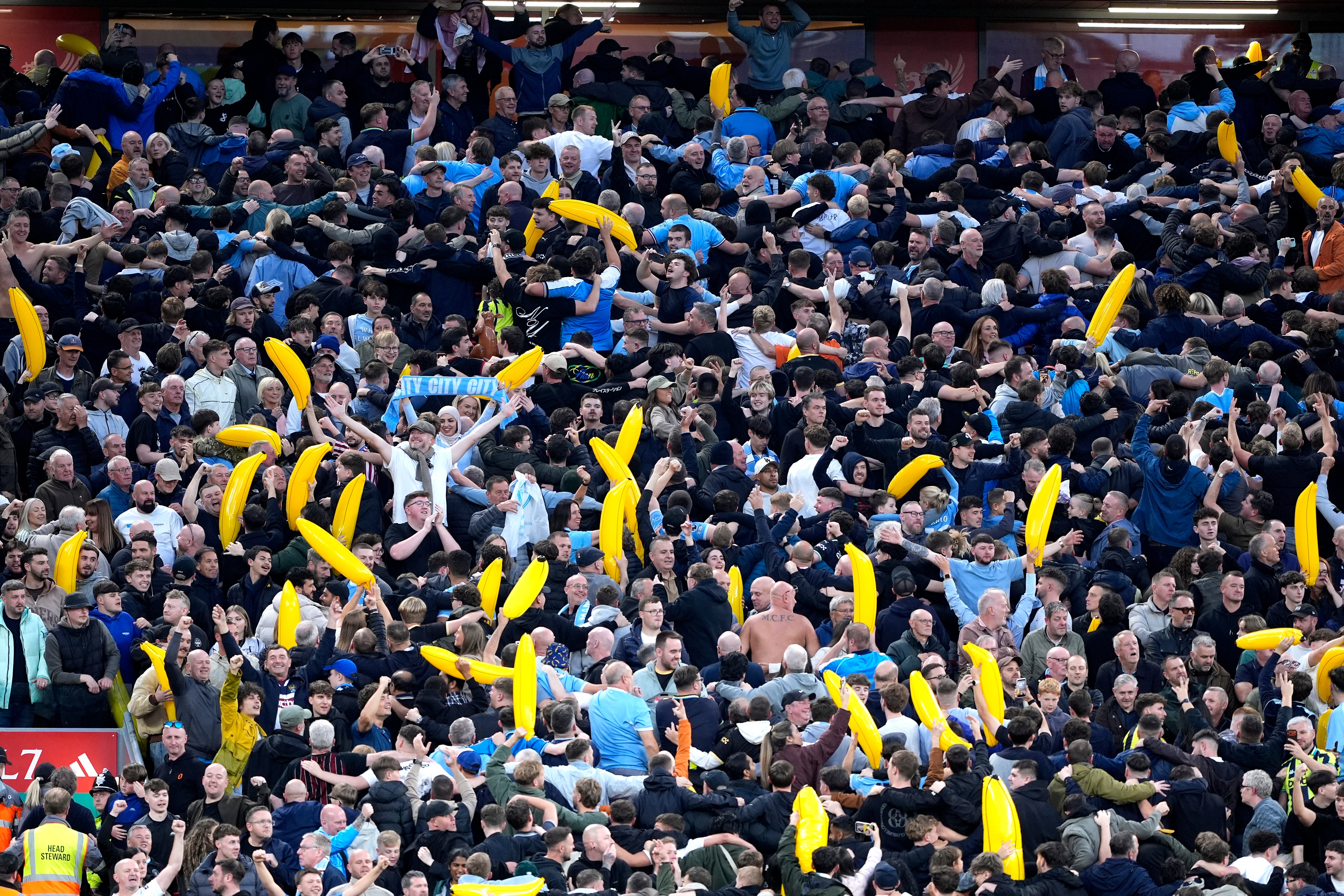 City fans hold up bananas during the match at Anfield