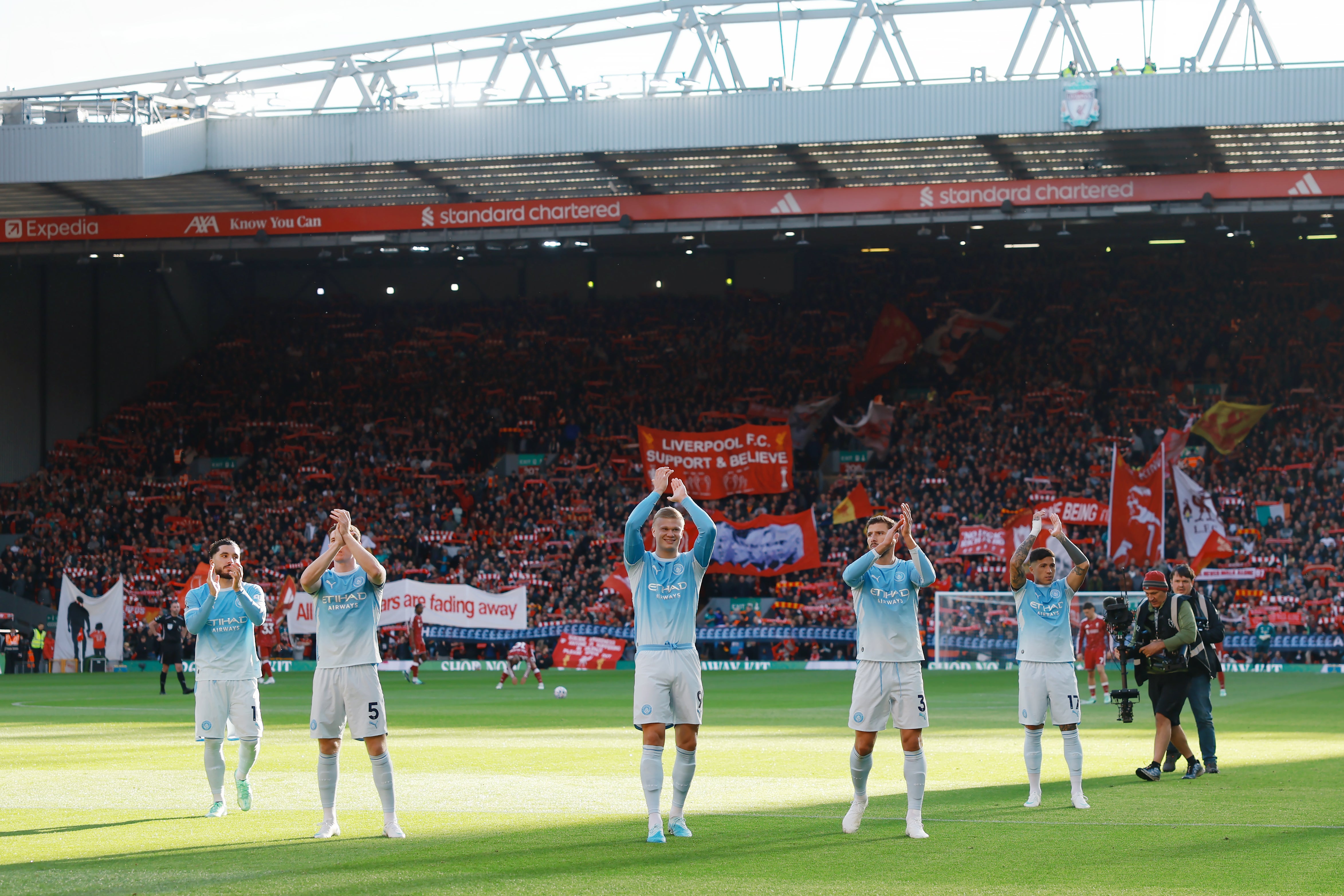 Manchester City celebrated their win at Anfield under the shadow of the independent commission's guilty verdict