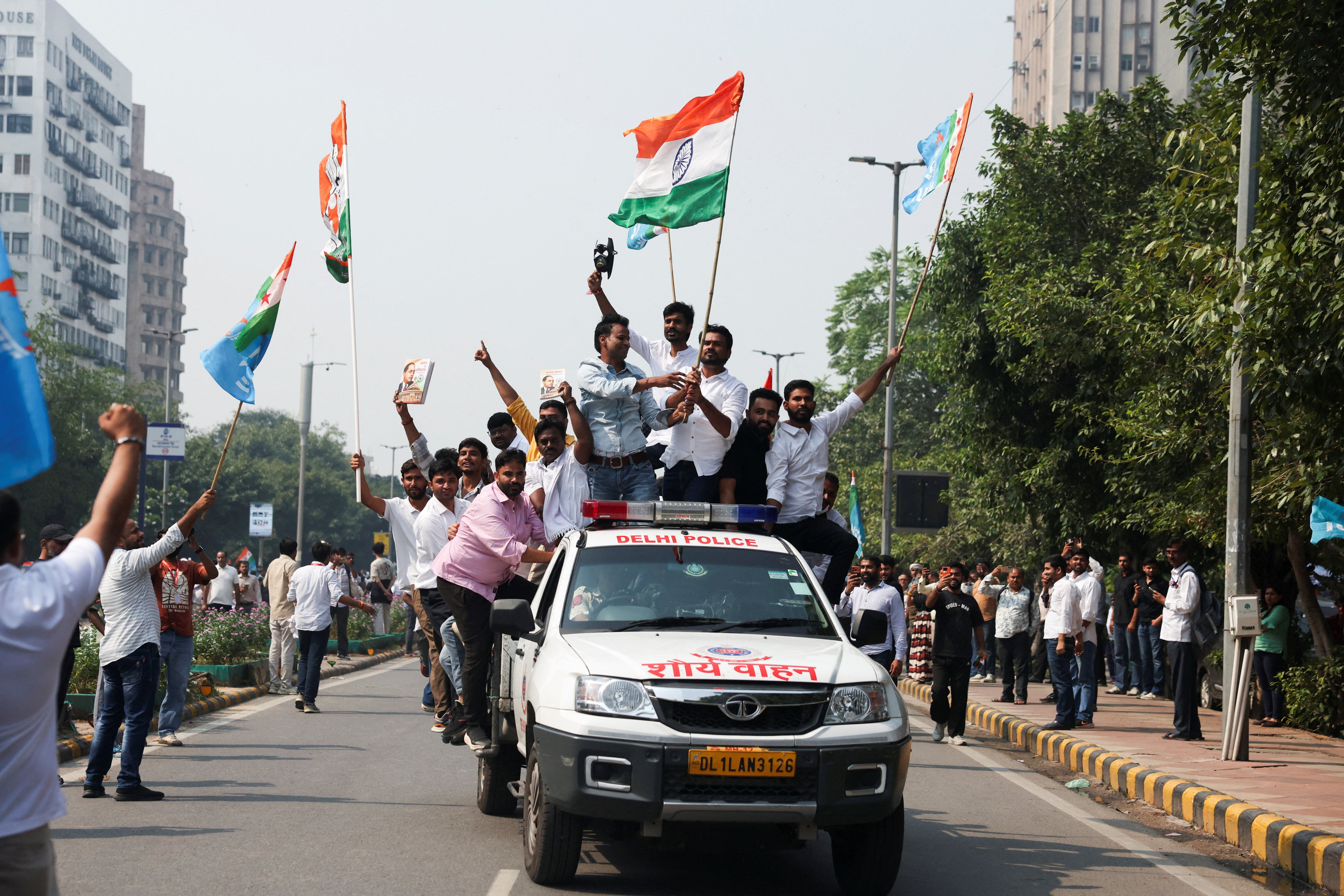 Defiant ‘cockroach’ leaders vow to continue protests in India despite ...