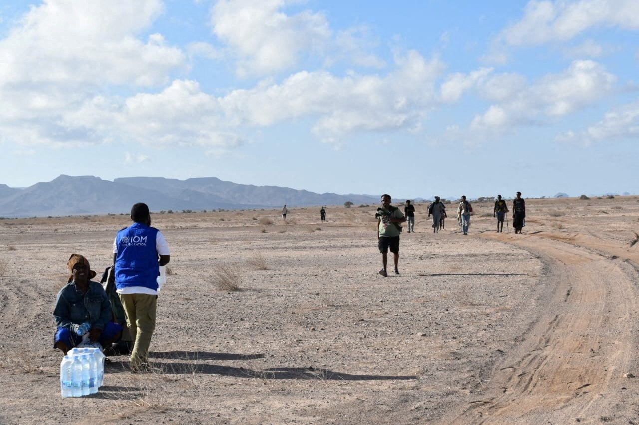 International Organization for Migration workers receive migrants after a boat carrying about 305 people capsized while sailing from Djibouti to Yemen.