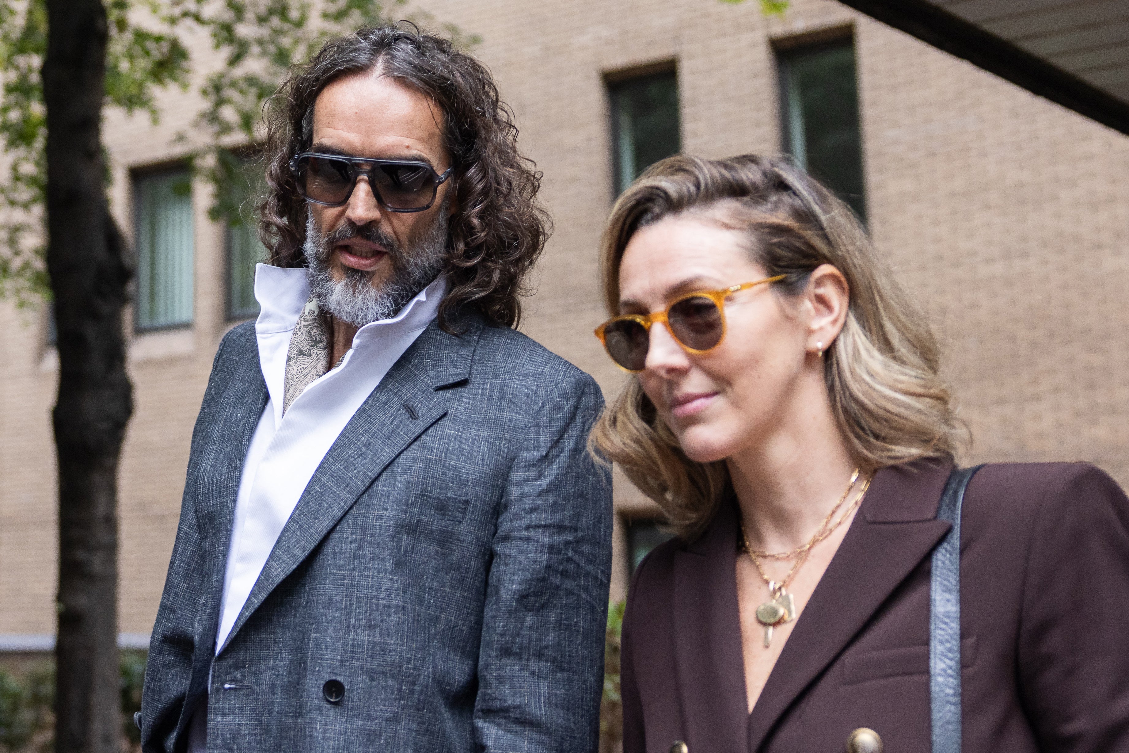 Meet the woman who is standing by Russell Brand as he goes on trial