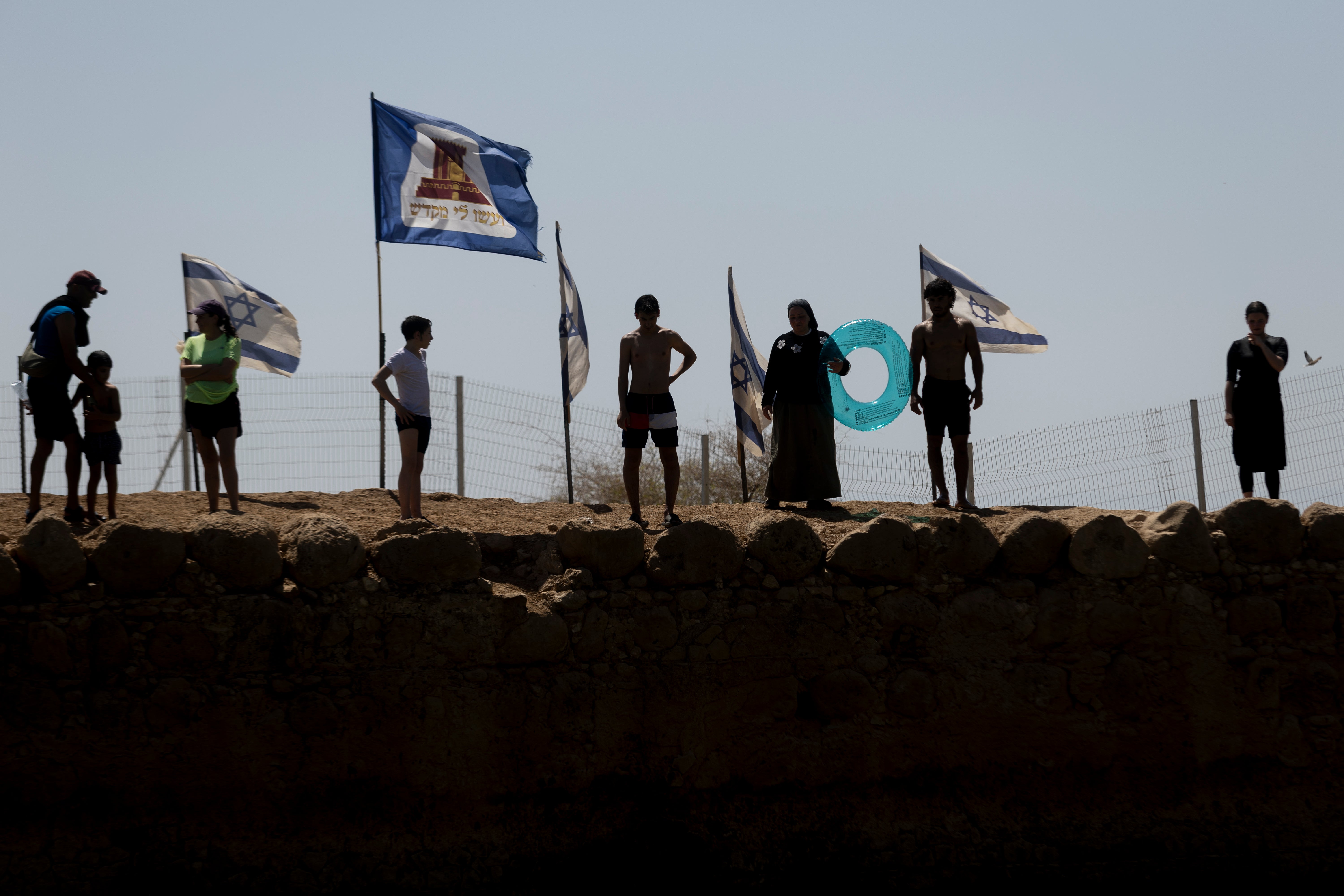 Israelis at an ancient archaeological site known as Herod's Pool near the Israeli settlement of Petza'el, West Bank