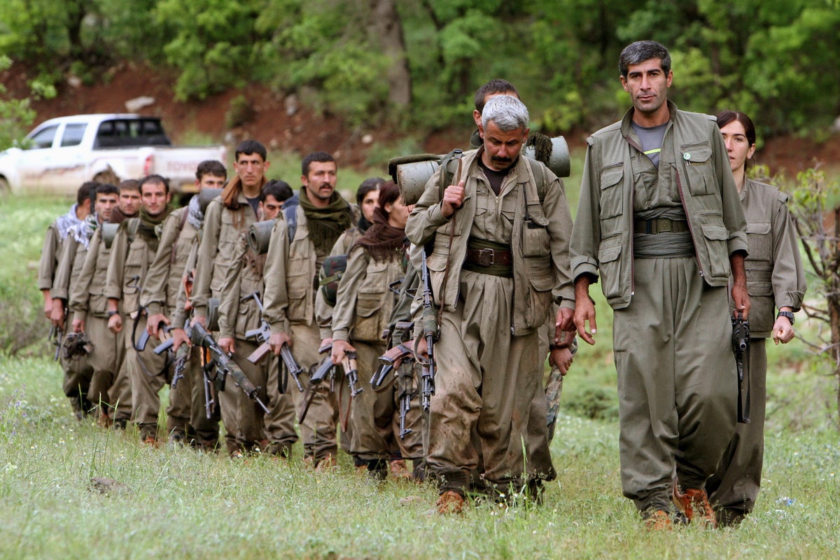 Kurdish PKK militants pull out of 4 camps in northern Iraq as part of peace process with Turkey