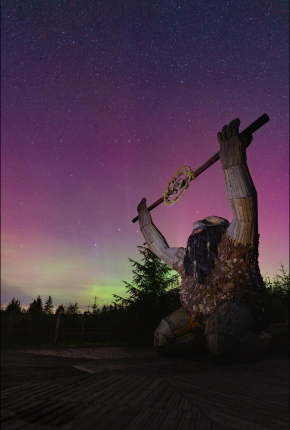 Northern lights at OM Dark Sky Park. The Giant pictured is one of the three giant sculptures on the trail across the Sperrin mountain range. The one pictured here is named Ceoldán and was created by sculptor Thomas Dambo