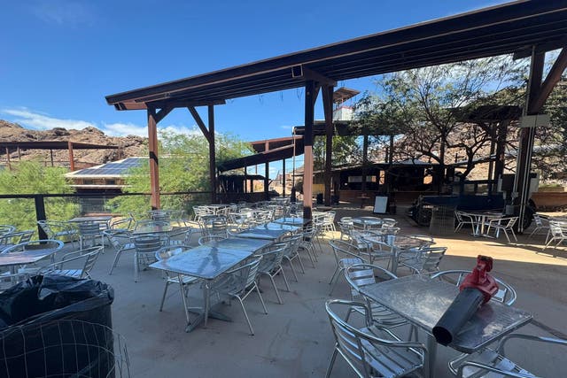 A remote saloon north of Parker, Arizona, famous for running entirely off the grid, was forced to close Sunday for the first time in 43 years after heavy storms washed out its sole access road