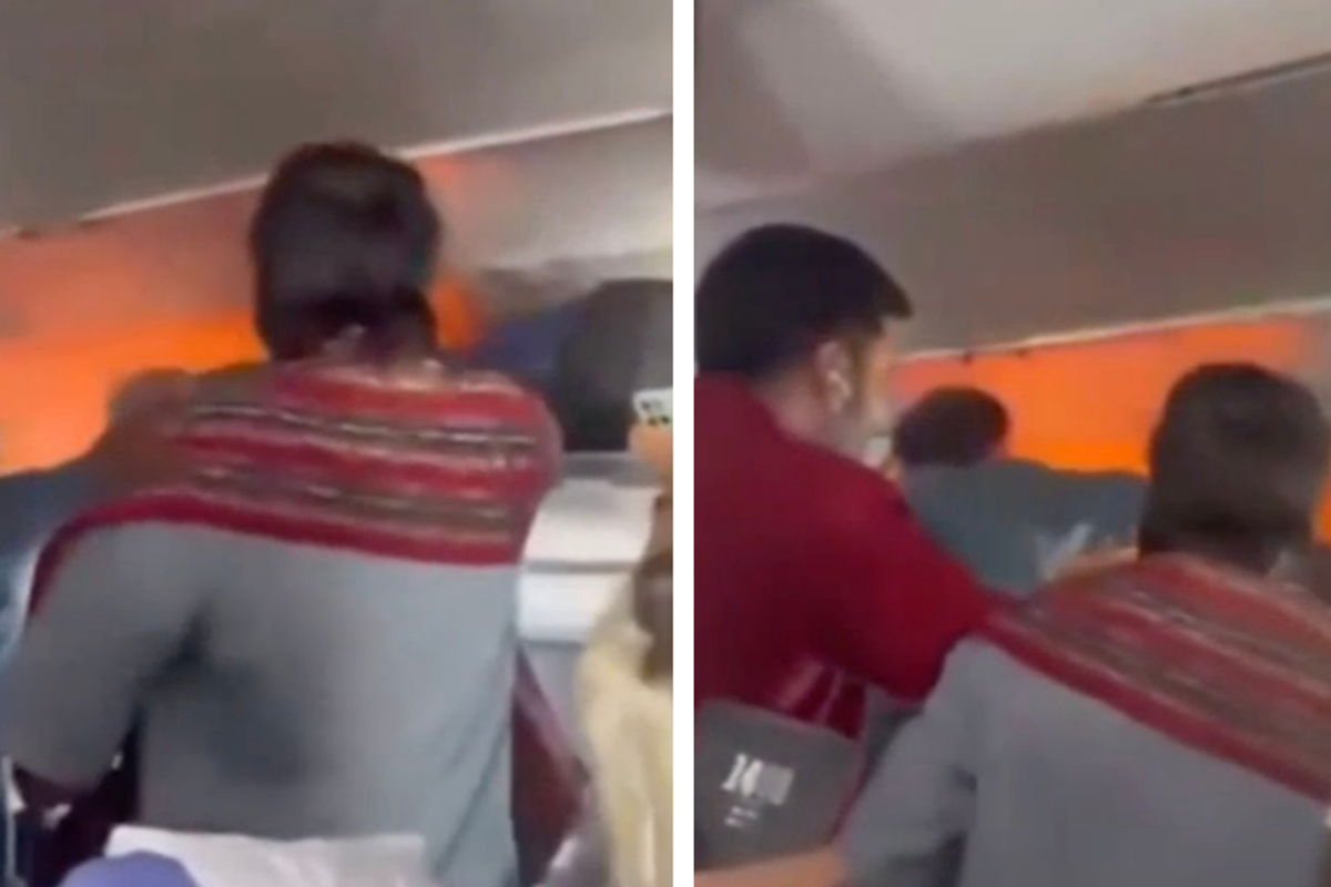Terrifying moment power bank bursts into flames on packed flight as passengers battle blaze
