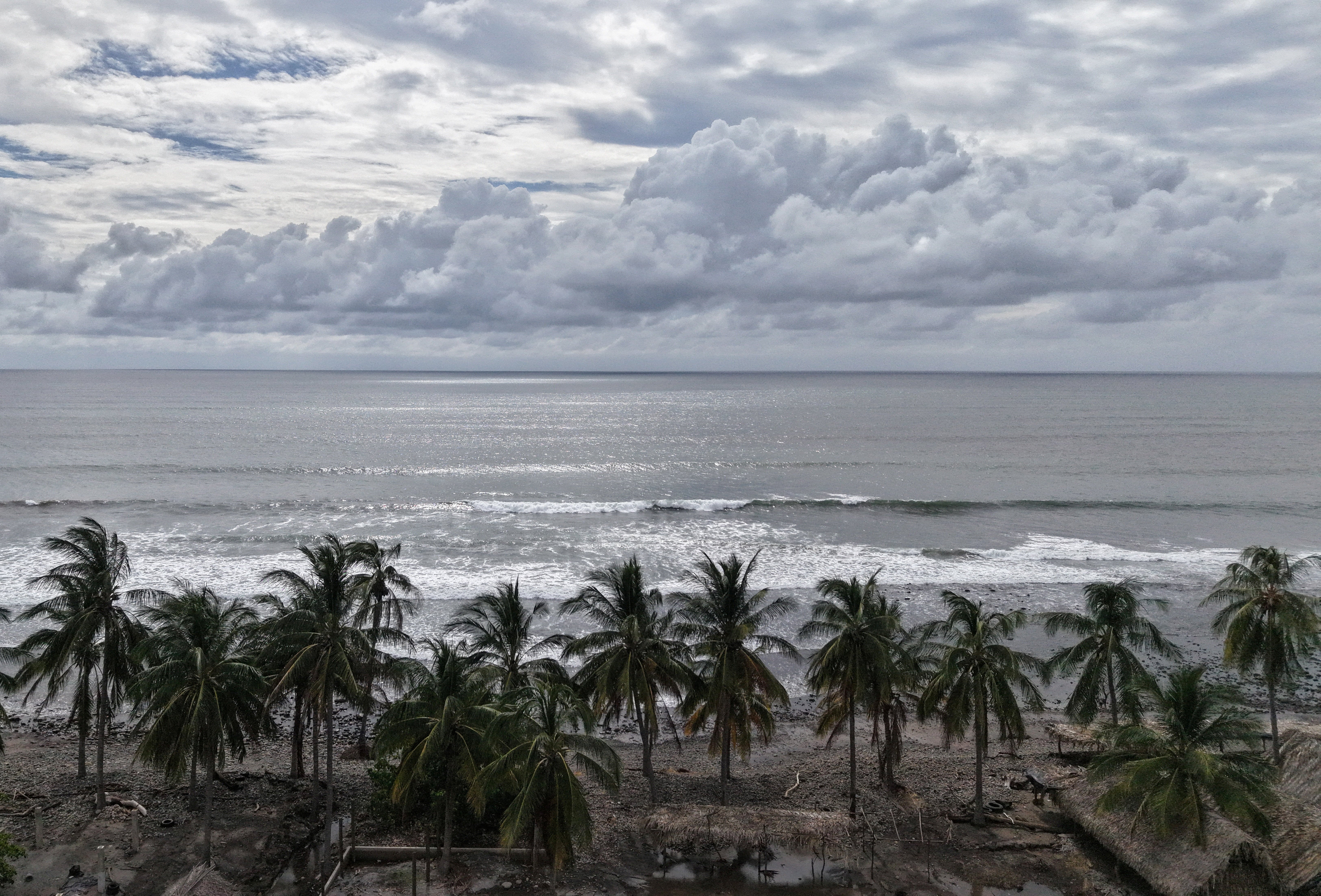 Waves break along the coastline in Aticama