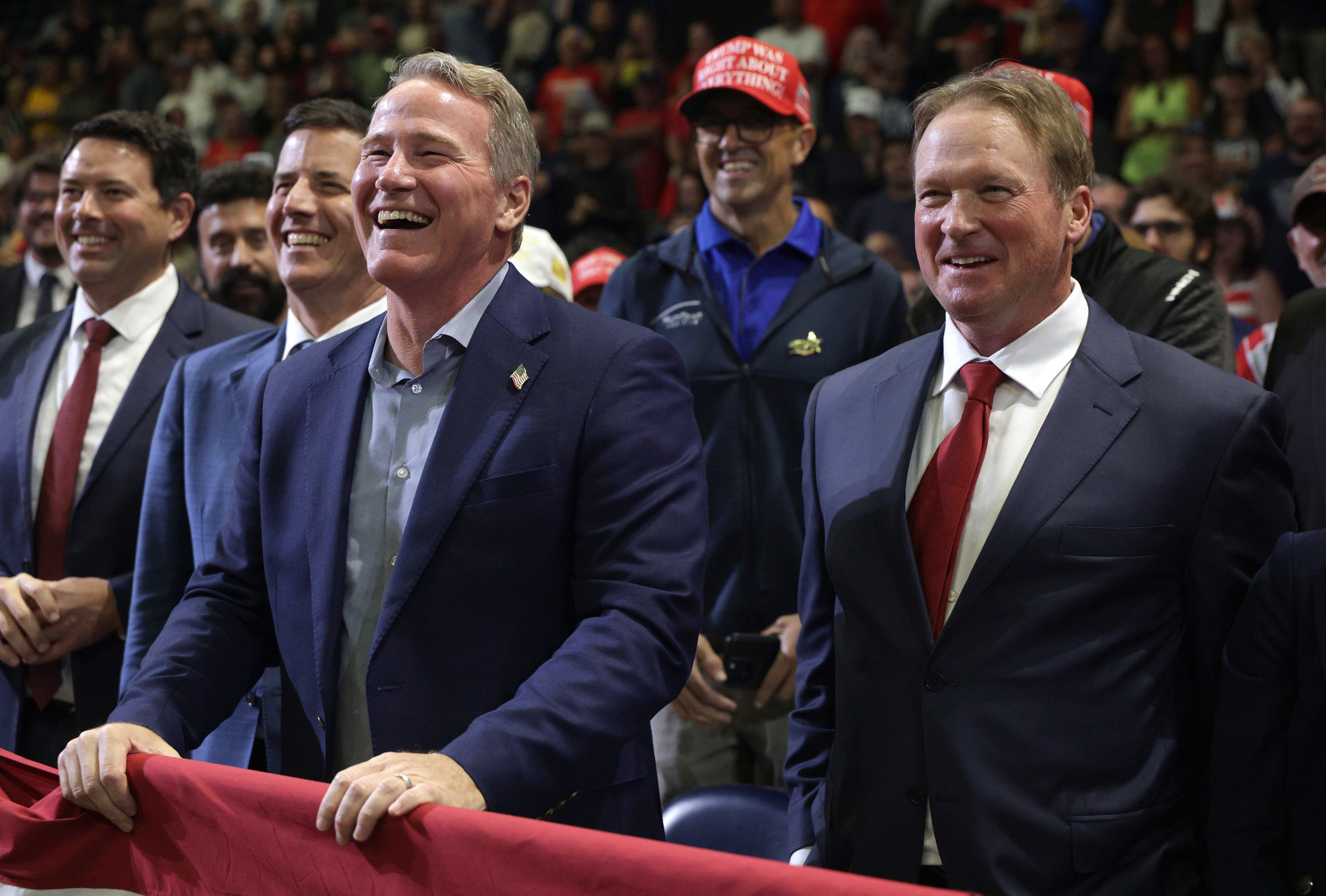 Jon Gruden, a former NFL and Super Bowl-winning coach, introduced the president at Monday’s rally and mentioned to Trump that he and Husted played together in college