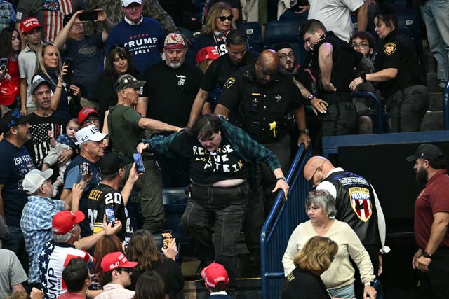 ‘Oh, he’s gotta go on a diet! He’s a fat guy,’ Trump said from the podium while the protester was escorted from the arena. ‘Wow, wow. Gotta go on a diet fast. We all do’
