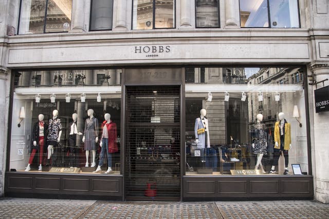 The owner behind womenswear brands Hobbs and Whistles apologised to customers on Tuesday after being hit by a cyber attack.