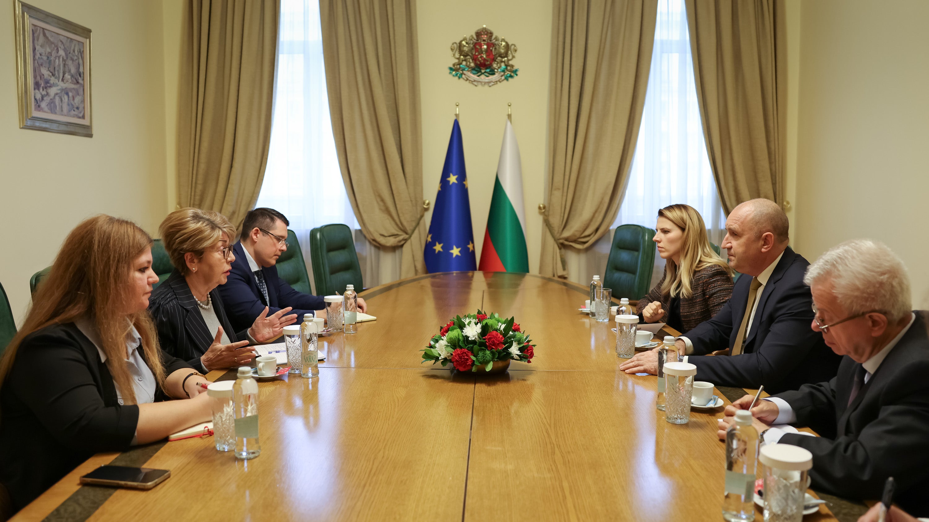Bulgarian Prime Minister Rumen Radev, 2nd right, speaks with Russian Ambassador to Bulgaria Eleonora Mitrofanova, 2nd left, in Sofia, Bulgaria