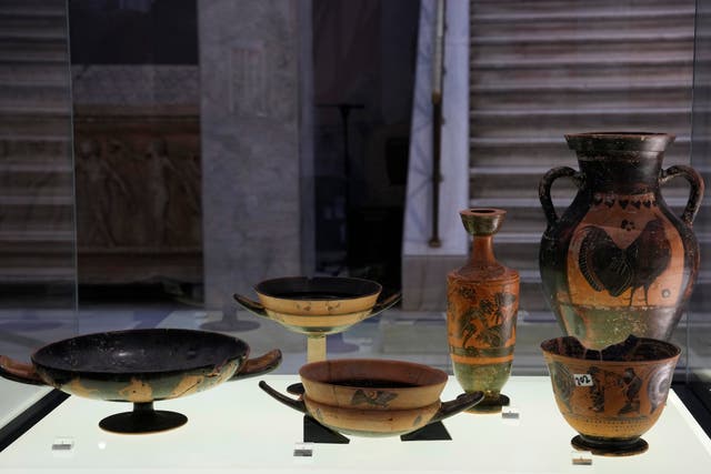 The vessels are decorated with mythological scenes