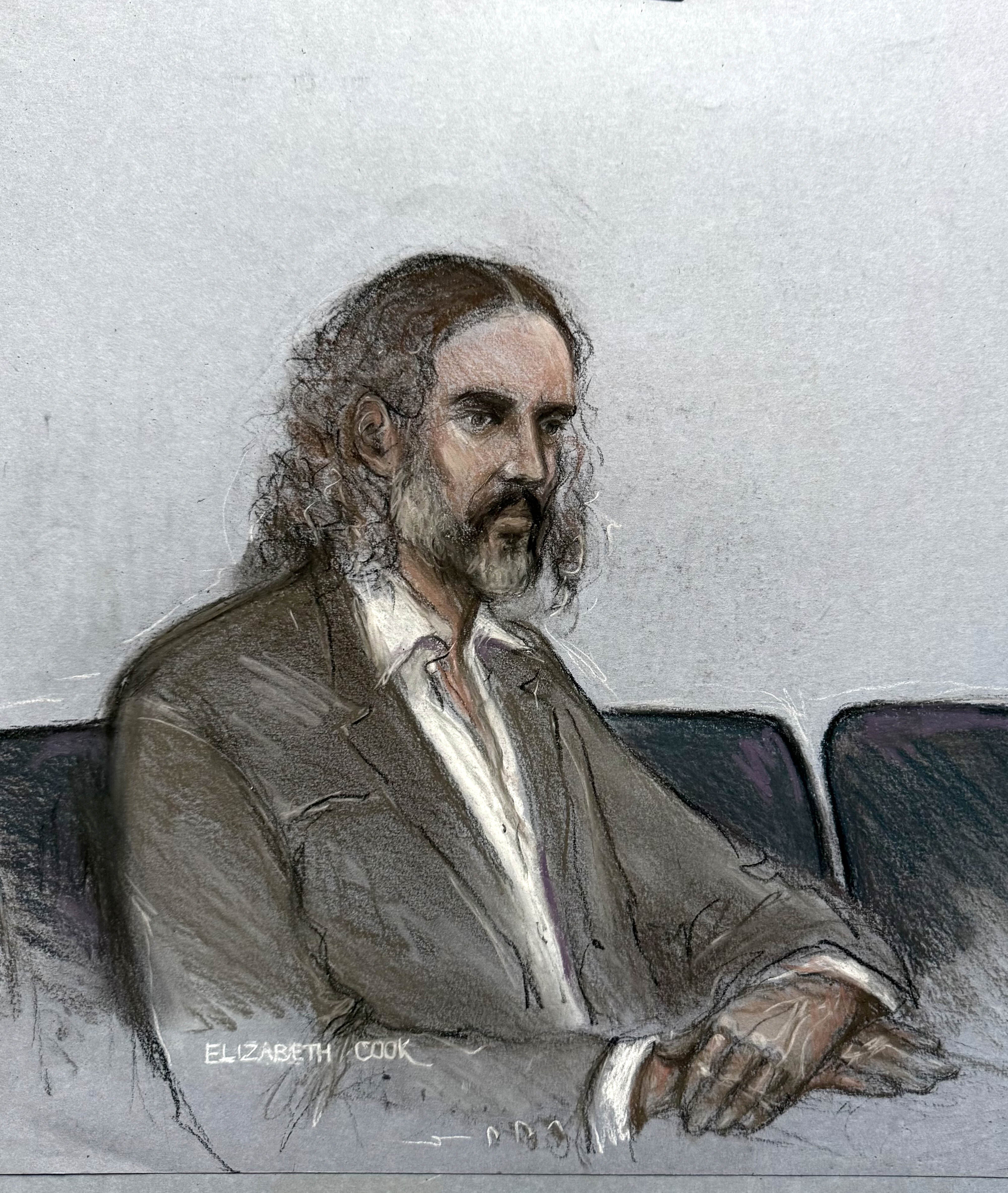 Court artist sketch of Russell Brand appearing during jury selection at Southwark Crown Court, London (Elizabeth Cook/PA) (PA)