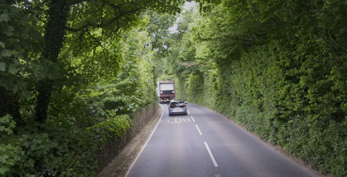 Driver arrested after woman dies in three-car crash on busy road