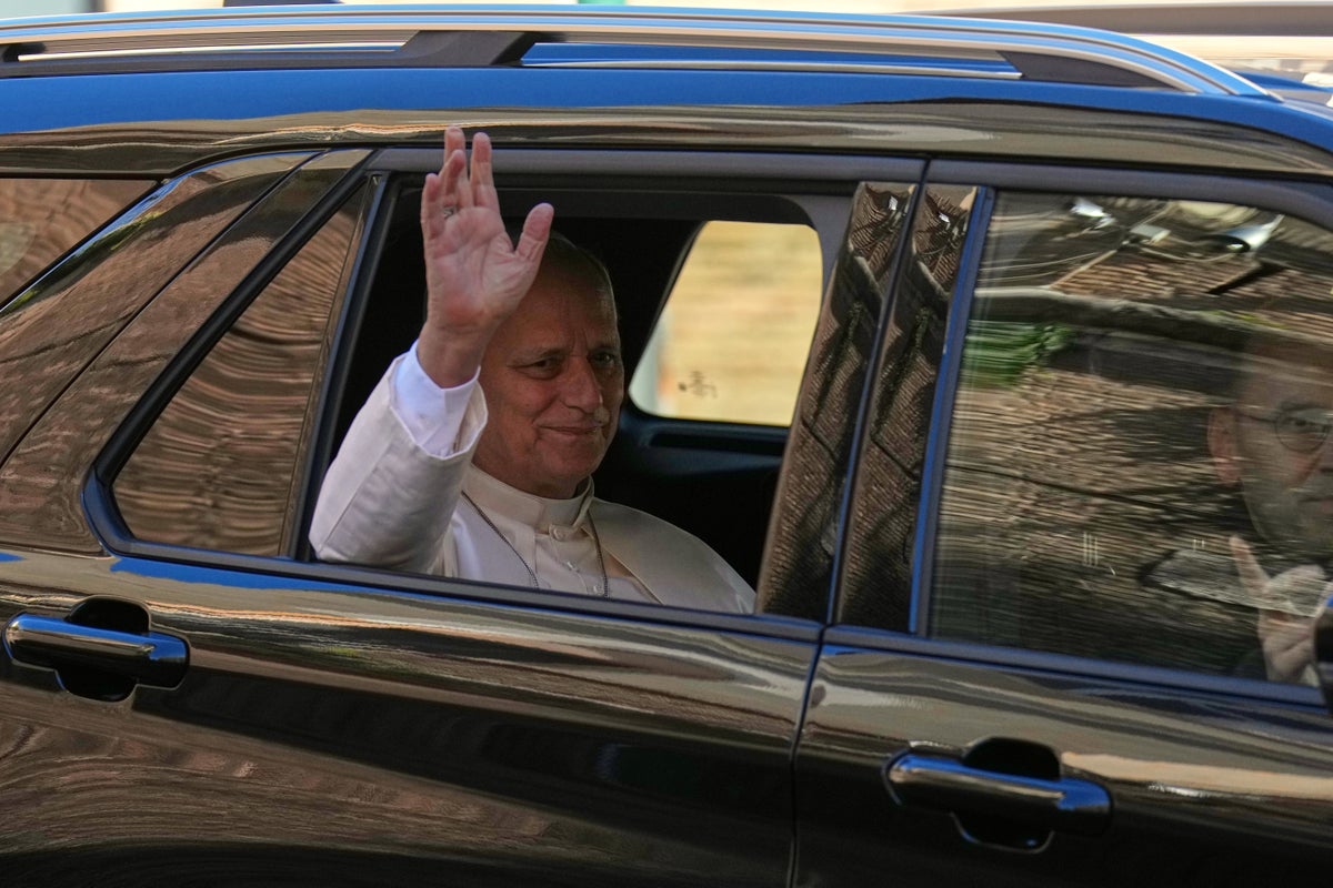 Photos show Pope Leo XIV at hospital and supporters praying as he undergoes cancer surgery