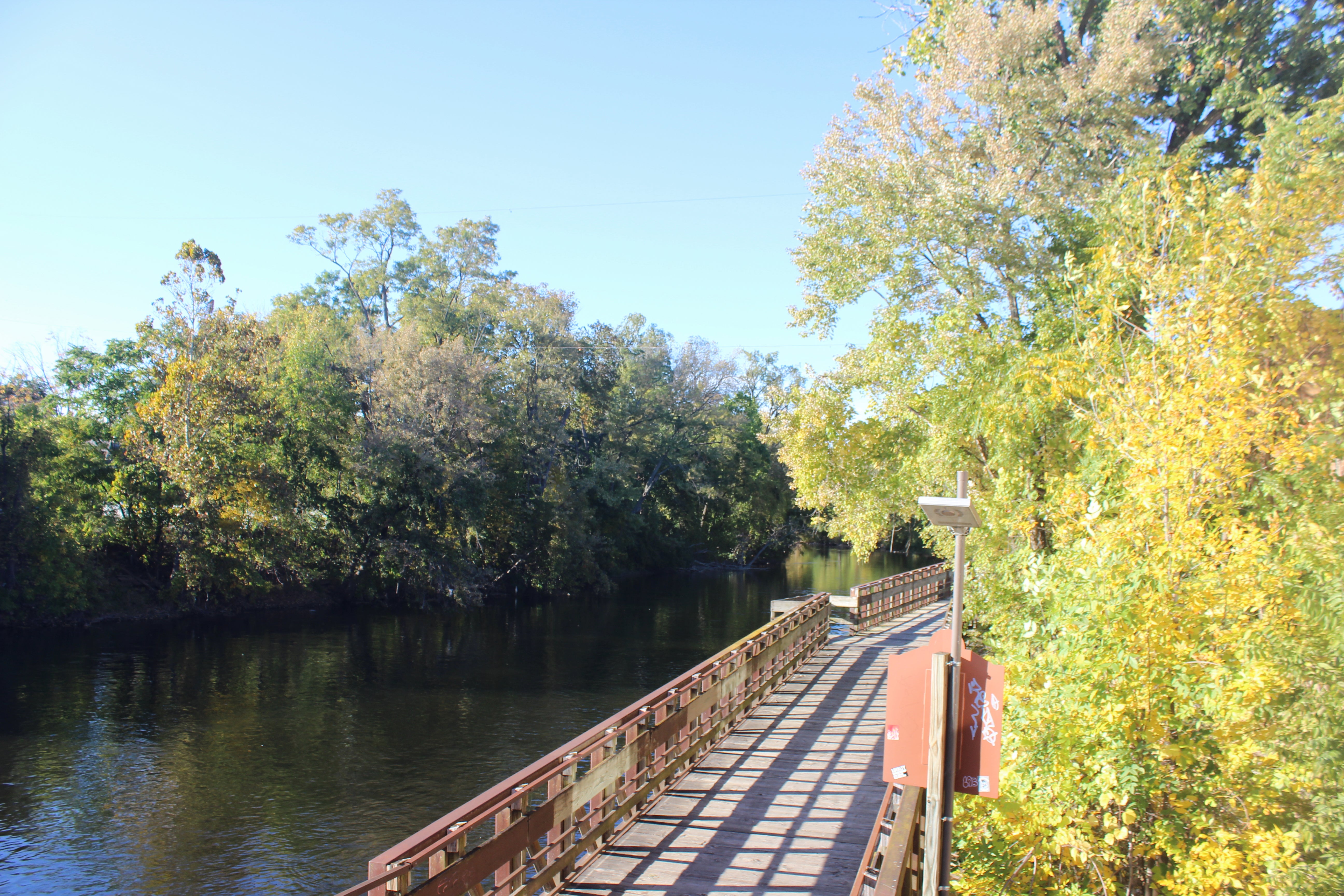 The deaths, which occurred along a single one-mile stretch of the Lansing River Trail over the last year, have put residents on edge and drawn criticism over local safety measures. Police have arrested one 23-year-old suspect thus far