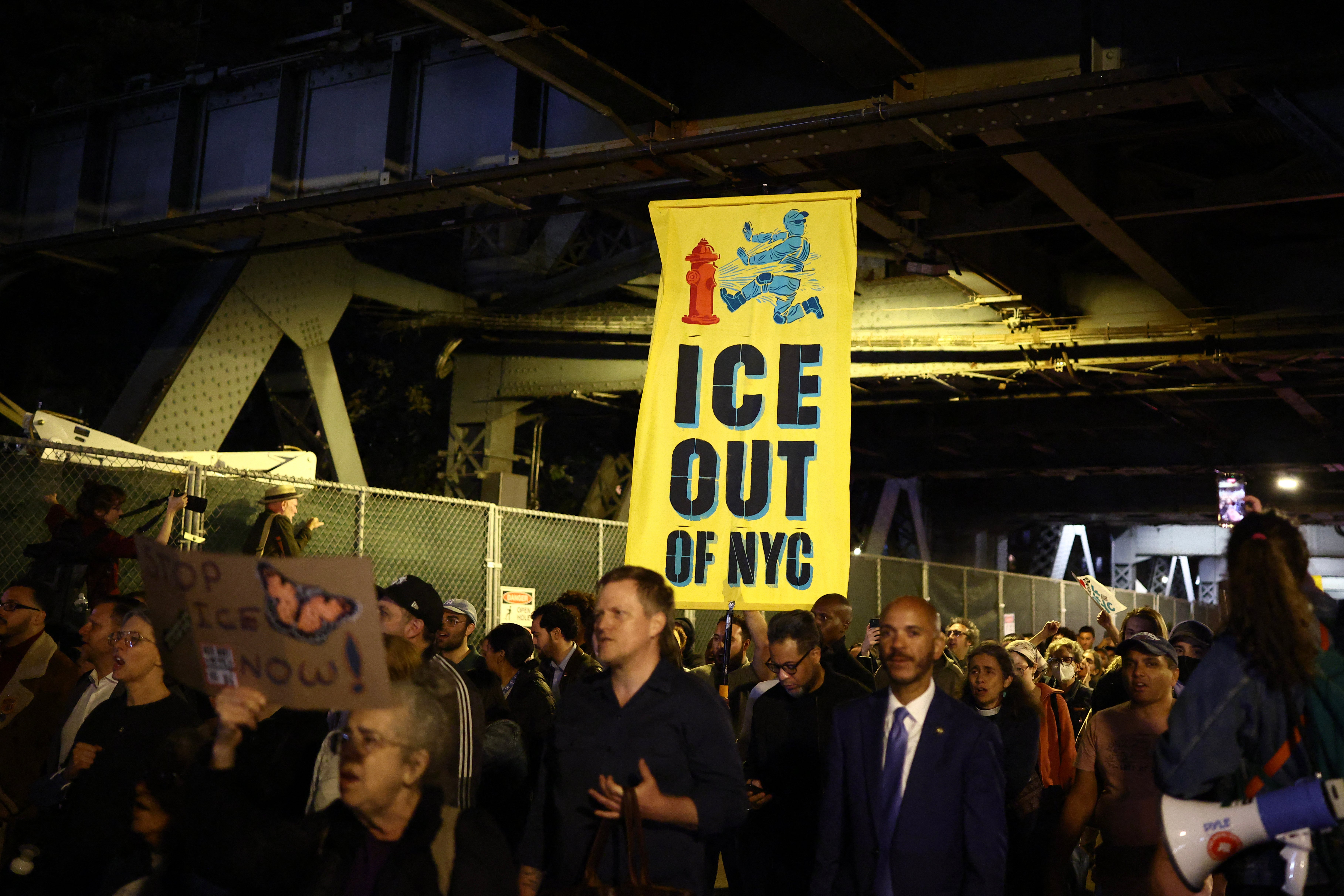 Protesters gather near the scene where a man was shot by an Immigration and Customs Enforcement (ICE) officer during an operation in the Bronx borough of New York on October 8, 2026, according to local media and police