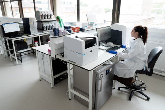 A person uses equipment in the Cancer Genomics lab at The Royal Marsden (Aaron Chown/PA)